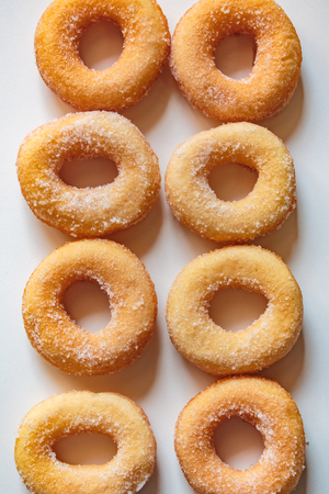 Donuts with sugar on white background, thai food style.の写真素材