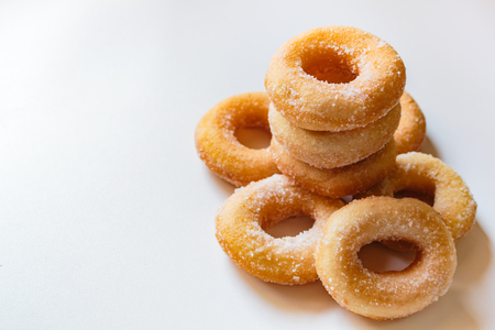 Donuts with sugar on white background, thai food style.の写真素材