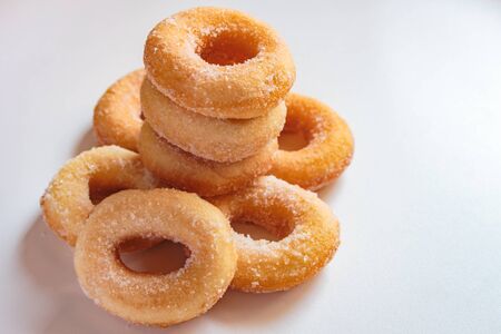 Donuts with sugar on white background, thai food style.の写真素材