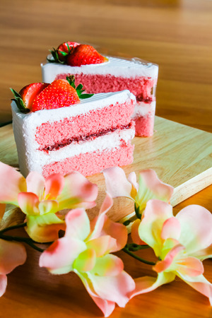 Strawberry cake dessert on wood background.の写真素材