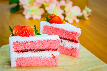 Strawberry cake dessert on wood background.の写真素材