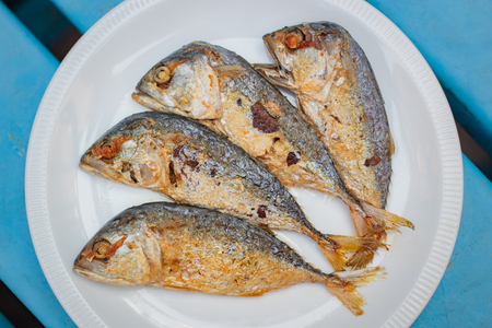 fried mackerel in white plate, thai food.の写真素材
