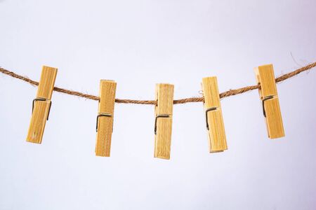 Wooden clip for clothes and rope.の写真素材