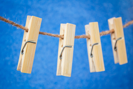 Wooden clip for clothes and rope.の写真素材