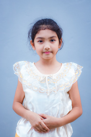 Sweet little girl with thai dress, thai people.の写真素材