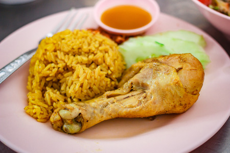 Muslim yellow jasmine rice with chicken (Khao mok kai), Halal chicken and curry rice.の写真素材