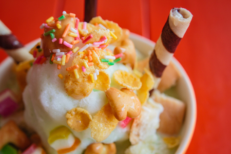 Shaved ice, thai style dessert made of shaved ice, bread, sweetened condensed milk.の写真素材