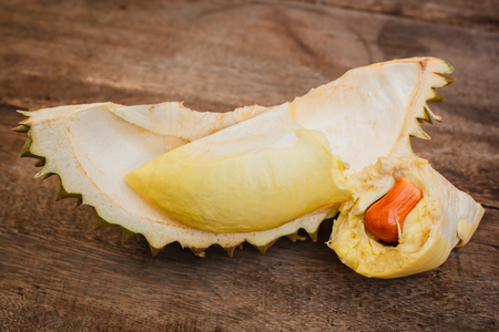 Durian on a wooden background, fresh fruit.の写真素材