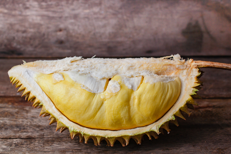 Durian on a wooden background, fresh fruit.の写真素材
