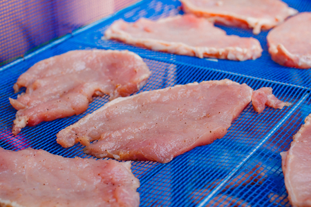Pork with sauce and sugar for sunlight, thailand's popular food (Moo Dad Deaw).の写真素材