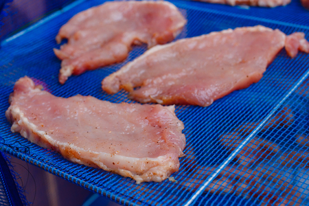 Pork with sauce and sugar for sunlight, thailand's popular food (Moo Dad Deaw).の写真素材