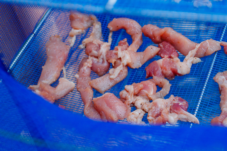 Pork with sauce and sugar for sunlight, thailand's popular food (Moo Dad Deaw).の写真素材