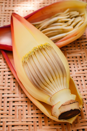 Banana blossom on bamboo tray in Thailand.の写真素材