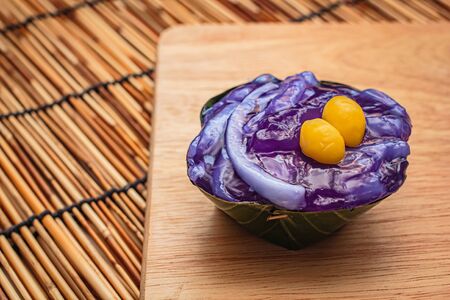 Thai desserts in banana leaf, natural ingredients.の写真素材