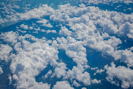 Beautiful blue sky and some clouds view from the airplane.の写真素材