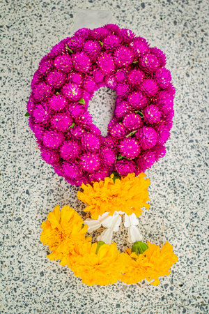Handmade globe amaranth flower garland, flower garland in Songkran Day symbol.の写真素材