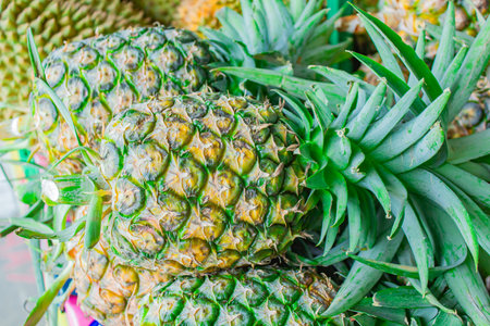 Pineapple for sale at fruit market in Bangkok.