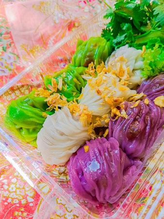 Thai steamed pork dumplings or Khao griep pag mor. Made from rice flour wrapped with various types of filling.の写真素材
