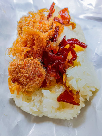 Thai food is "khao niew moo tod", Sticky rice and deep fried pork food thai style.の写真素材