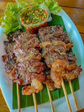 Grilled beef on skewers with spicy sauce, Grilled meat skewers.の写真素材