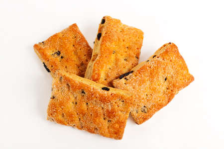Baking cookies with raisins on white backgroundの写真素材