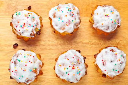 Baking cupcakes with raisins on the chalkboardの写真素材