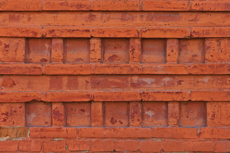 ornamental pattern of an old brick wall, texture, background の写真素材