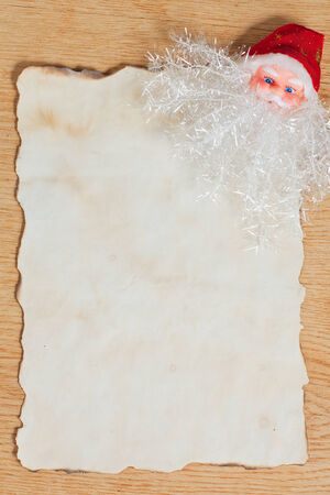Christmas letter for Santa with old parchment and Santa Claus decorationの写真素材