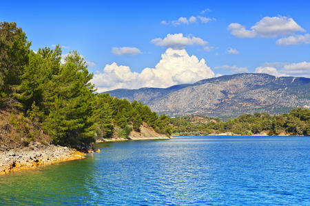 View of the coast and the mountains from the water side.の写真素材
