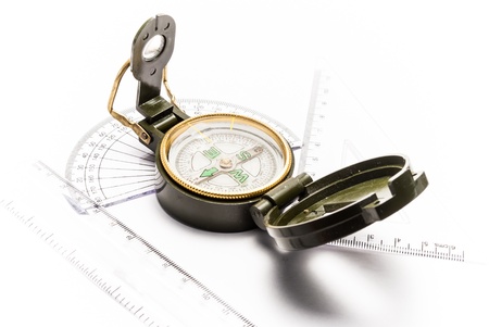 Compass and measuring instruments on white backgroundの写真素材