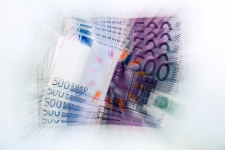 Dramatic vortex effect of 500 euro banknotes on white background (European Union)の写真素材