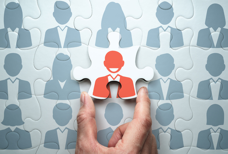 Selecting leader and building team. Business leadership concept.
Connecting last jigsaw puzzle piece.の写真素材