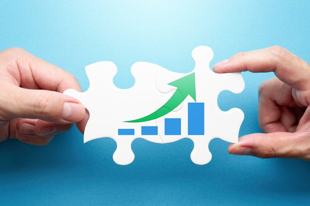 Solution for problem of growth. Two hands connecting jigsaw puzzle pieces. Illustration of graph and...