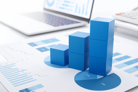 Business growth and analysis. Many graphs on reports and laptop display.の写真素材
