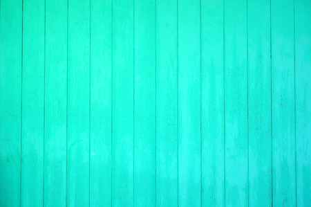 old wooden wall painted greenの写真素材
