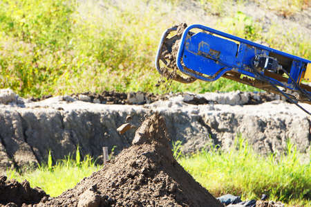 Carrying soil conveyor belt on construction siteの写真素材