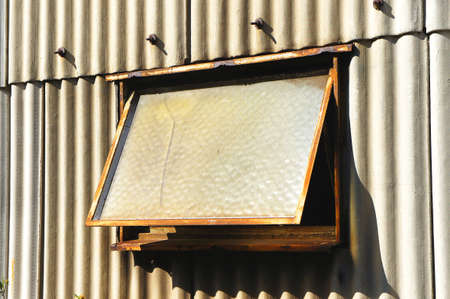 Small window on the wallの写真素材