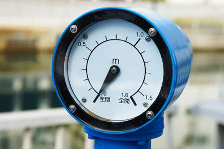 Close up sluice gate meter