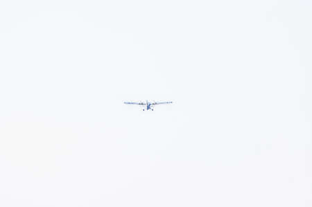 Propeller plane immediately after takeoffの写真素材