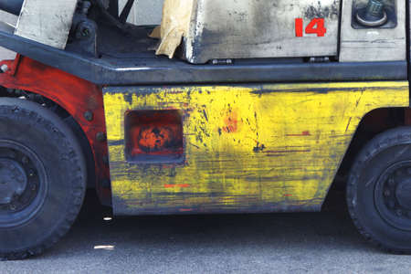 Working forklift parked on the roadの写真素材