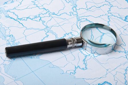 magnifying glass on the map background