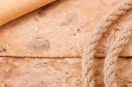 rope and bamboo on the background of old paperの写真素材