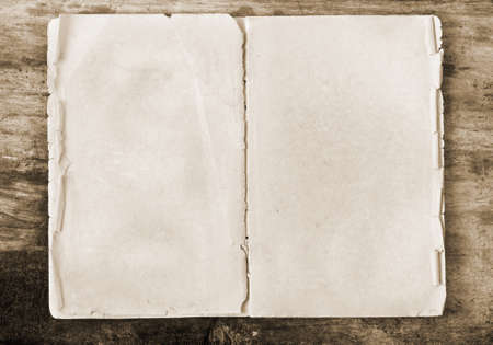 Paper on old wooden background