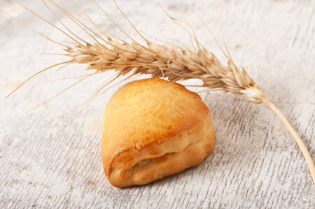 bakery products on old wooden background