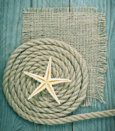 ship rope on wooden texture backgroundの写真素材
