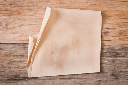 old paper on old wooden backgroundの写真素材