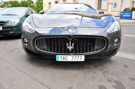 PRAGUE, THE CZECH REP., MARCH 25, 2009: luxury Maserati in big city in Europeのeditorial素材