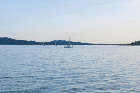 Ocean with a blue sky and yachts. Yacht sailing on a sea.の写真素材