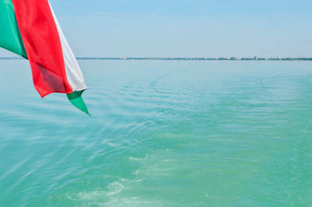 Boat rear view on sea. Sunset and rear view from yacht.の写真素材