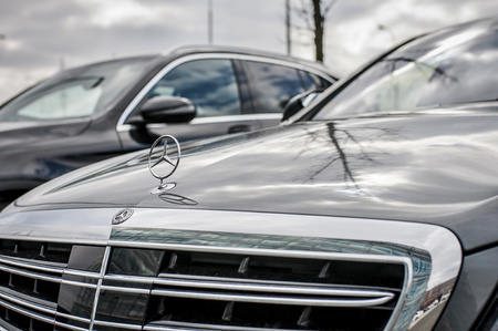 PRAGUE, THE CZECH REPUBLIC, 24.3.2018 - Closeup Front view Mercedes Benz S400d in front of Car store...